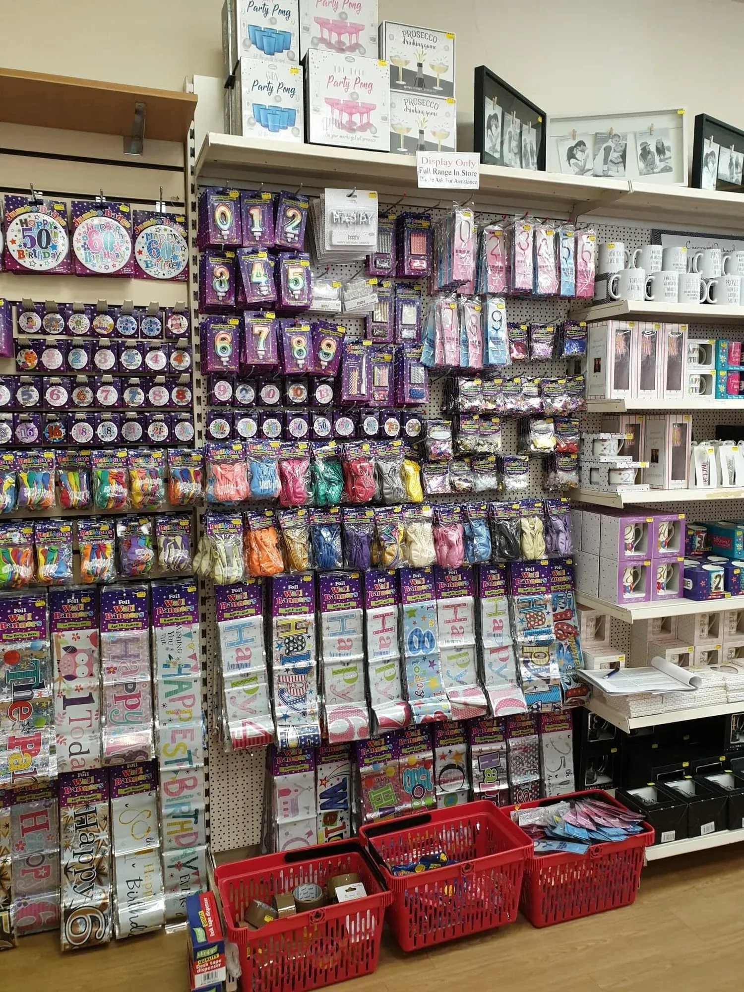 A fixture of cards, badges and small gifts